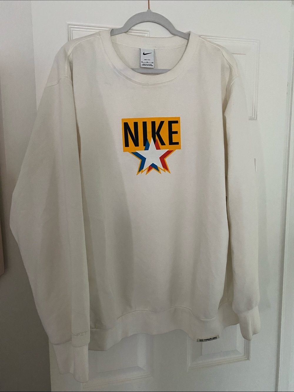 Nike Men’s Cream Crewneck with Multicolor Star Logo